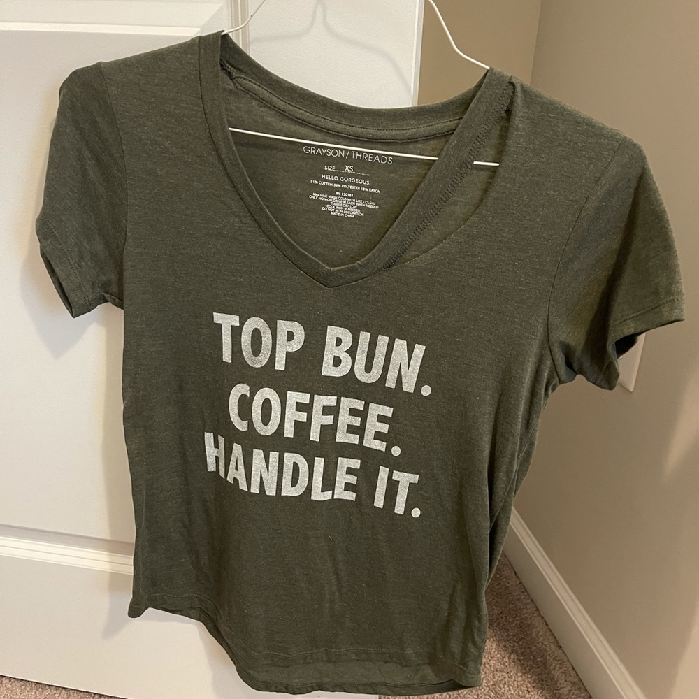 New without tags tee with shoulder cut out